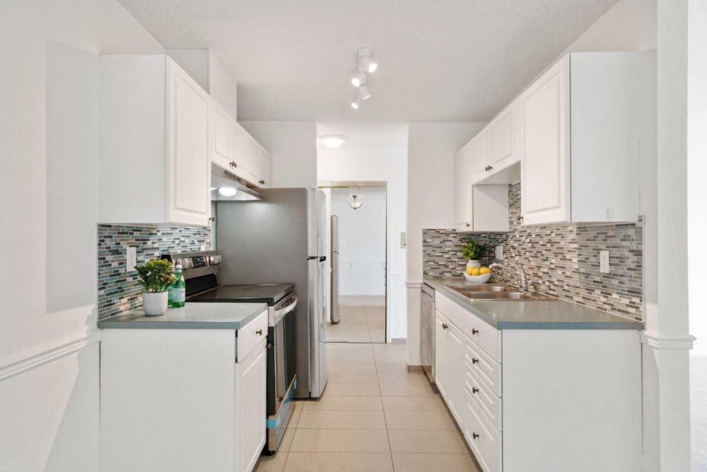 Photo of 1113 37 Street SW #404, Calgary, AB T3C 1S5 (MLS # A2284680)