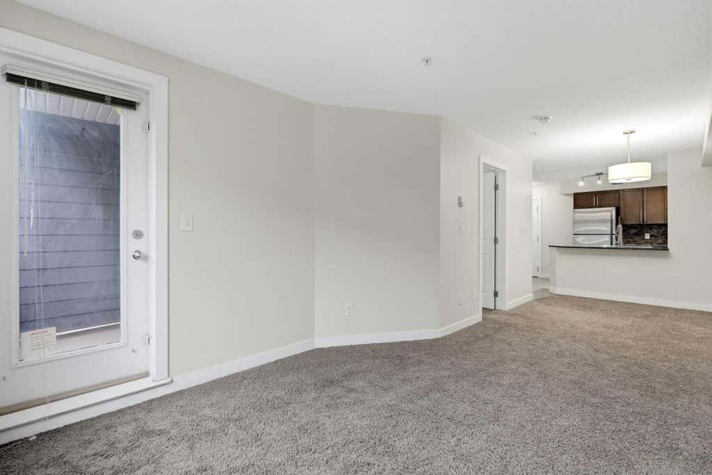 Photo of 7110 80 Avenue NE #215, Calgary, AB T3J 0N4 (MLS # A2322310)