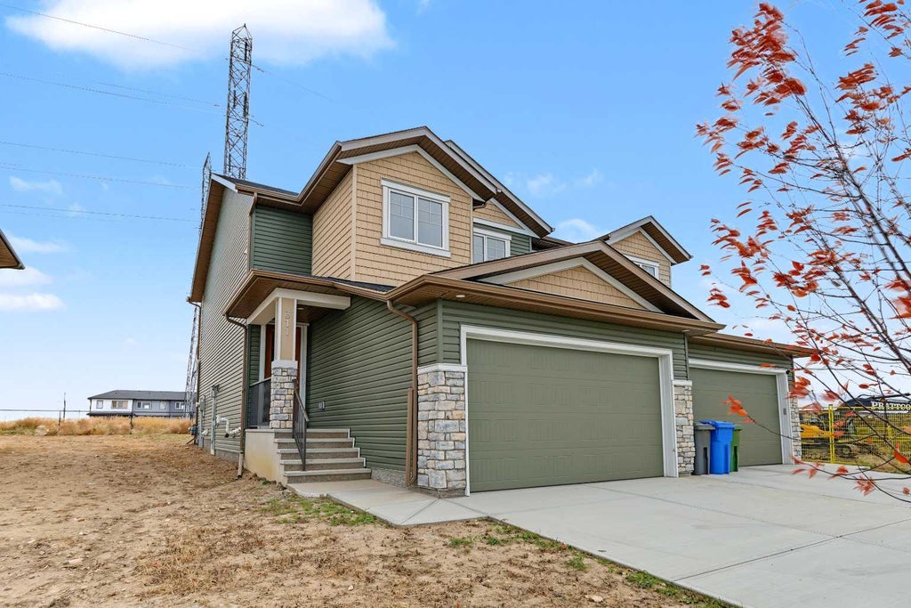 Photo of 311 Dawson Dock Way, Chestermere, AB T1X 2W4 (MLS # A2352652)