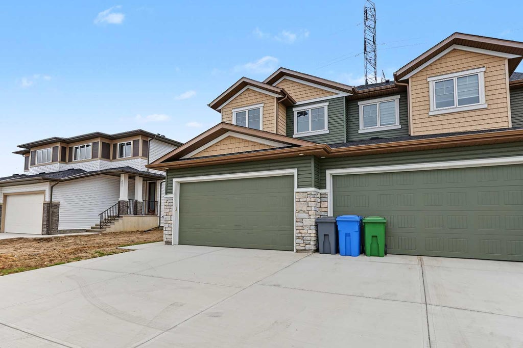 Photo of 311 Dawson Dock Way, Chestermere, AB T1X 2W4 (MLS # A2352652)