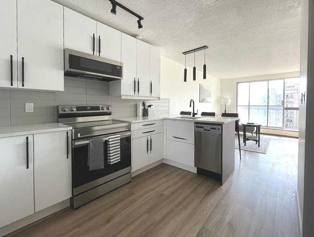 Photo of 340 14 Avenue SW #703, Calgary, AB T2R 0M4 (MLS # A2296698)