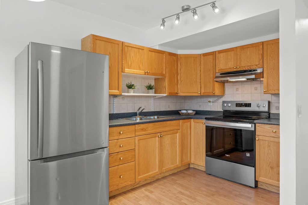 Photo of 6223 31 Avenue NW #605, Calgary, AB T3B 3X2 (MLS # A2329366)