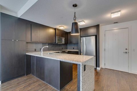 Photo of 25 Aspenmont Heights SW #107, Calgary, AB T3H 0E4 (MLS # A2252950) Photo of 25 Aspenmont Heights SW #107, Calgary, AB T3H 0E4 (MLS # A2252950)