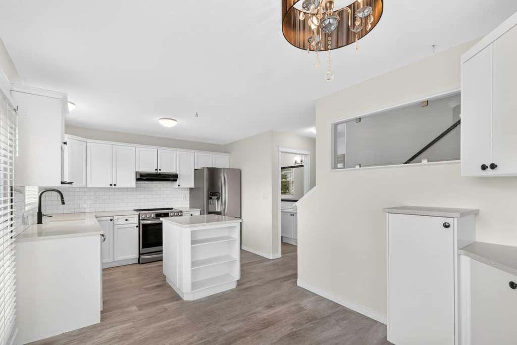 Photo of 213 Pinnacle Drive, Grande Prairie, AB T8W 0A9 (MLS # A2319200)