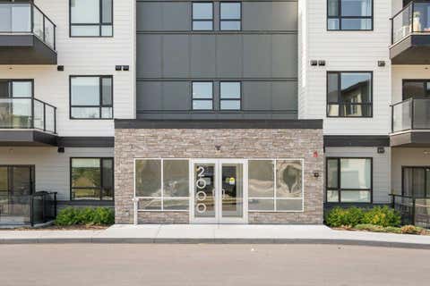 Photo of 42 Cranbrook Gardens SE #2310, Calgary, AB T3M 3P9 (MLS # A2324768)