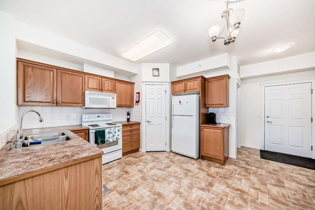 Photo of 15 Everstone Drive SW #446, Calgary, AB T2Y 5B5 (MLS # A2306964)