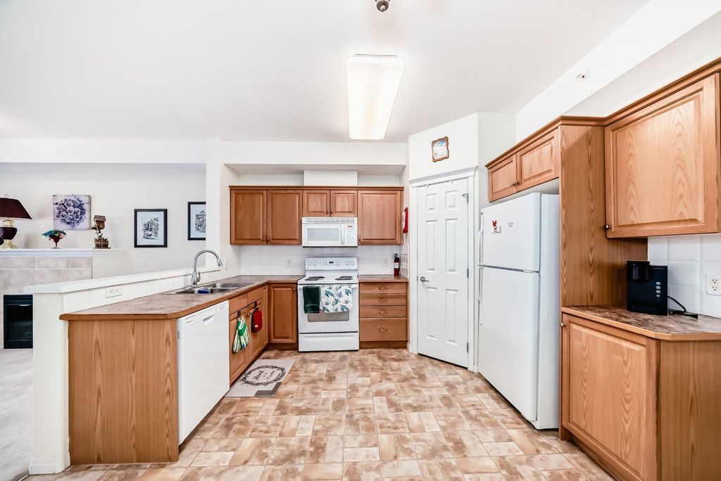 Photo of 15 Everstone Drive SW #446, Calgary, AB T2Y 5B5 (MLS # A2306964)