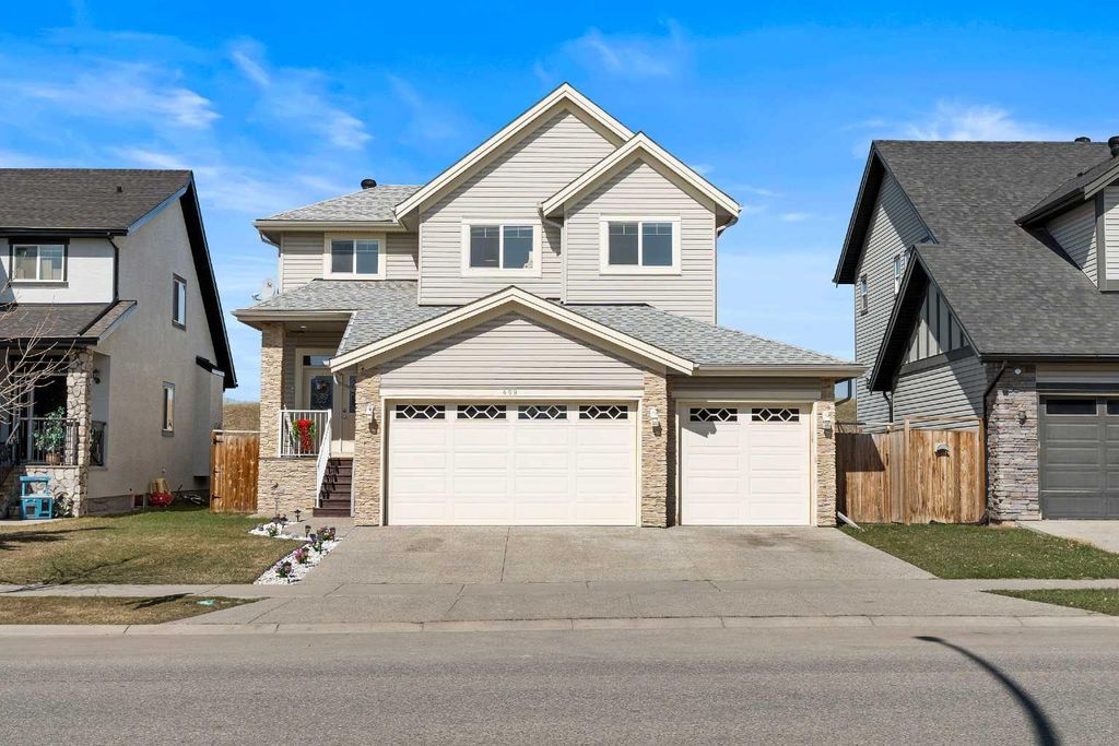 Photo of 409 Kinniburgh Boulevard, Chestermere, AB T1X 0P4 (MLS # A2305122)