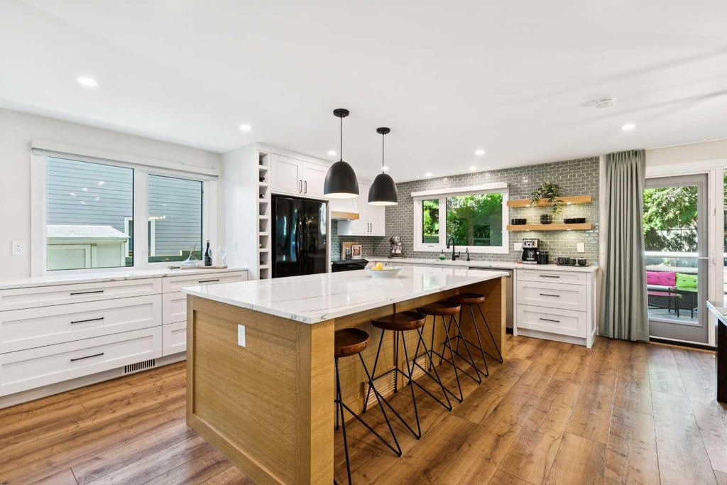 Photo of 272 Woodfield Road SW, Calgary, AB T2W 5P6 (MLS # A2327693)