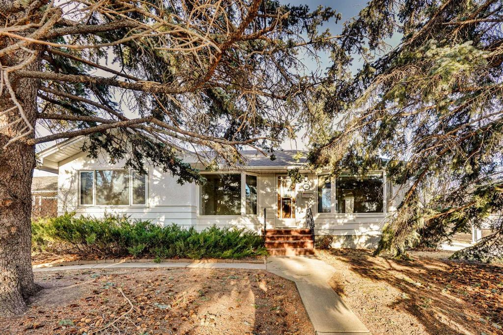 Photo of 1956 Kelwood Drive SW, Calgary, AB T3E 3Z3 (MLS # A2275340)