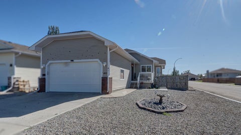 Photo of 405 46 Avenue W, Claresholm, AB T0L 0T0 (MLS # A2347381)