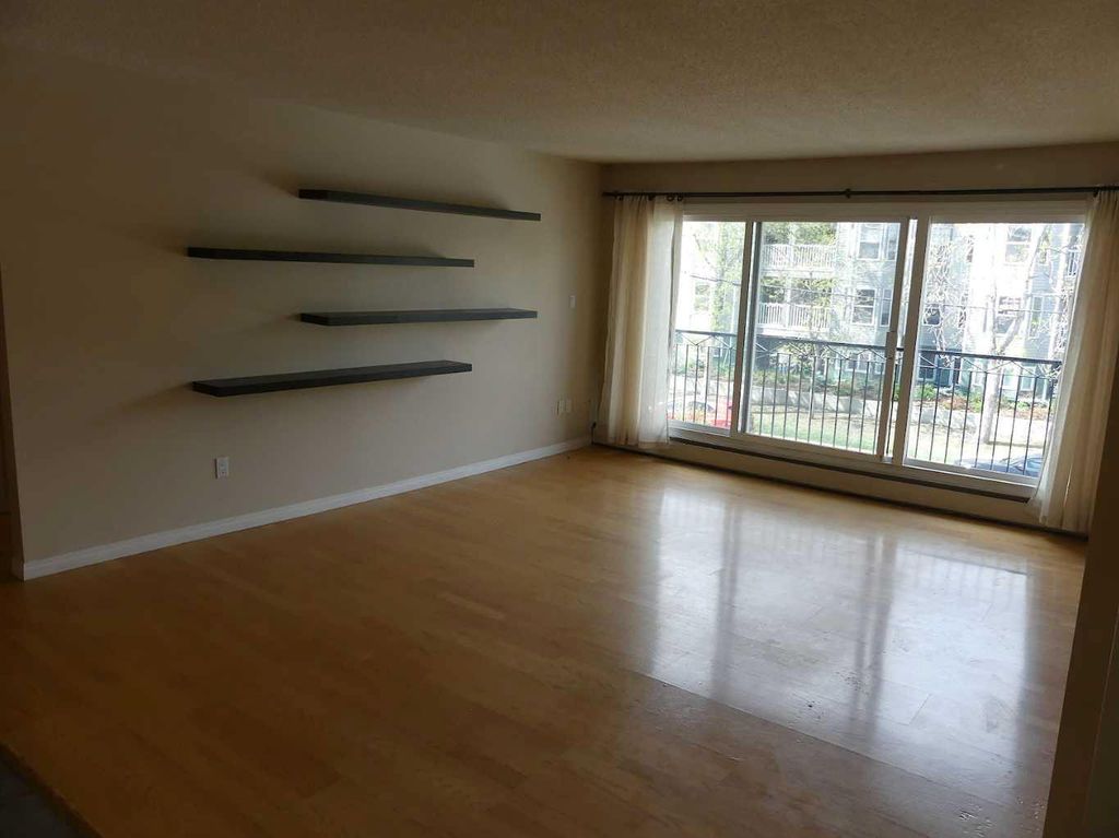 Photo of 117 23 Avenue SW #302, Calgary, AB T2S 0H9 (MLS # A2292279)