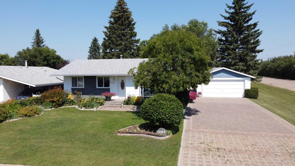 Photo of 1046 17 Avenue, Wainwright, AB T9W 1K2 (MLS # A2341008)