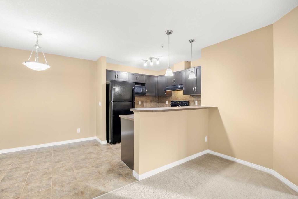 Photo of 115 Prestwick Villas SE #2222, Calgary, AB T2Z 0M9 (MLS # A2284658)