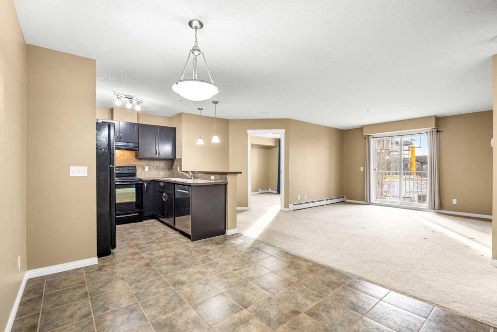 Photo of 115 Prestwick Villas SE #2222, Calgary, AB T2Z 0M9 (MLS # A2284658)