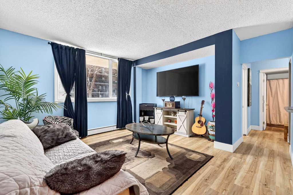 Photo of 1312 13 Avenue SW #102, Calgary, AB T3C 0T3 (MLS # A2326431)