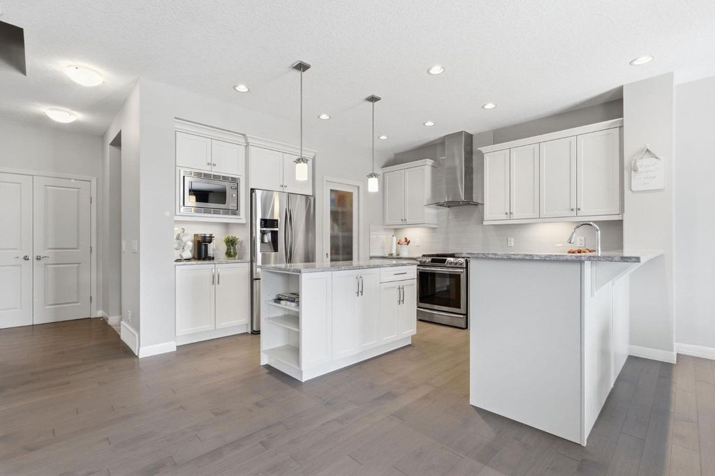 Photo of 132 Sundown Way, Cochrane, AB T4C 2M6 (MLS # A2303130)