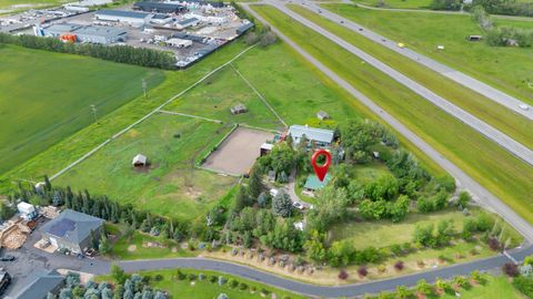 338067 1064 Drive E Rural Foothills County AB T1S 4T2