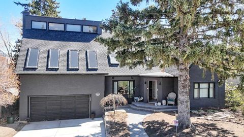 Photo of 1616 Summer Street SW, Calgary, AB T3C 2J6 (MLS # A2308218)
