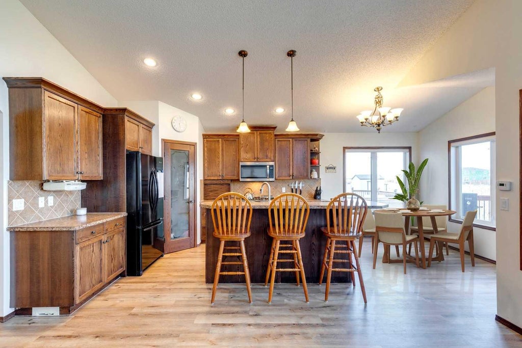 Photo of 203 Bishop Mews NW, Langdon, AB T0J 1X2 (MLS # A2324278)