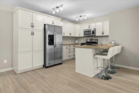 Photo of 175 Panatella Hill NW #2203, Calgary, AB T3K 0V9 (MLS # A2307225)
