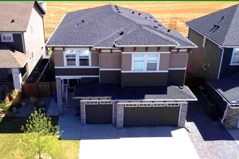 Photo of 114 KINNIBURGH Road, Chestermere, AB T1X 0S5 (MLS # A2308886)