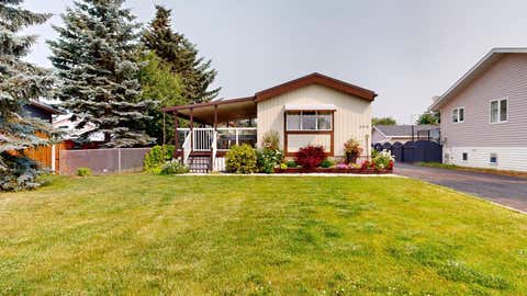 Photo of 304 Slade Drive, Nanton, AB T0L 1R0 (MLS # A2332836)
