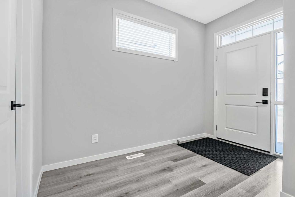 Photo of 68 Wolf Gate, Okotoks, AB T1S 5T9 (MLS # A2306574)