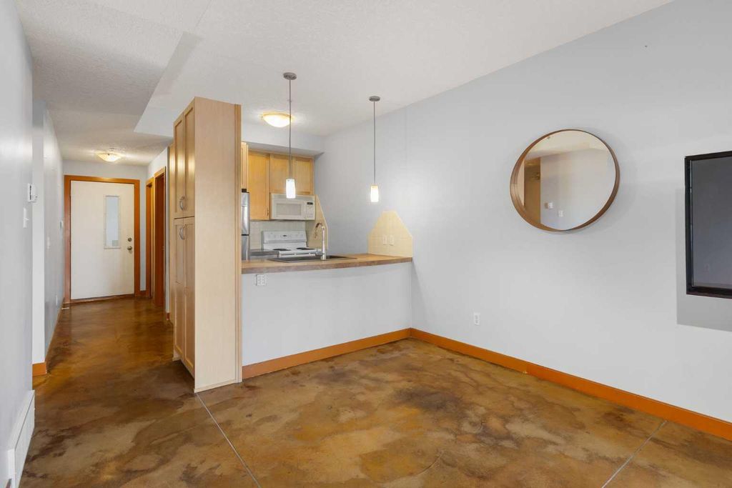 Photo of 1235 13 Avenue SW #110, Calgary, AB T3C 0T2 (MLS # A2312153)