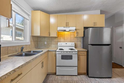 Photo of 5908 Trelle Drive NE, Calgary, AB T2K 3V4 (MLS # A2249479) Photo of 5908 Trelle Drive NE, Calgary, AB T2K 3V4 (MLS # A2249479)