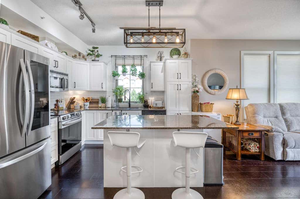 Photo of 205 Sunset Drive #320, Cochrane, AB T4C 0H6 (MLS # A2339002)