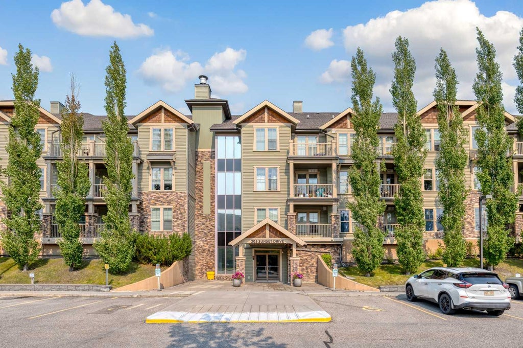 Photo of 205 Sunset Drive #320, Cochrane, AB T4C 0H6 (MLS # A2339002)
