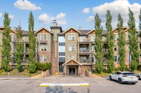 Photo of 205 Sunset Drive #320, Cochrane, AB T4C 0H6 (MLS # A2339002)
