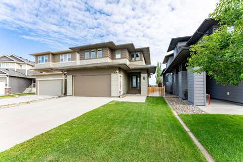 Photo of 437 Devonia Way W, Lethbridge, AB T1J 5J7 (MLS # A2329586)