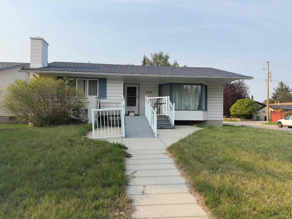 Photo of 5004 Valiant Drive NW, Calgary, AB T3A 0Y5 (MLS # A2339483)