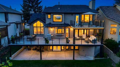 Photo of 95 Woodridge Close SW, Calgary, AB T2W 5M2 (MLS # A2334396)