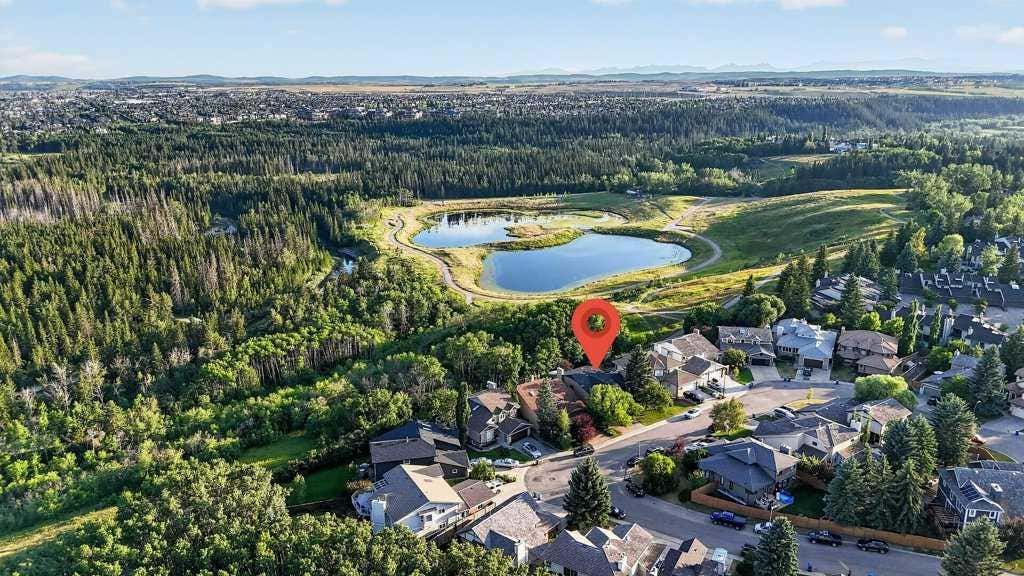 Photo of 95 Woodridge Close SW, Calgary, AB T2W 5M2 (MLS # A2334396)