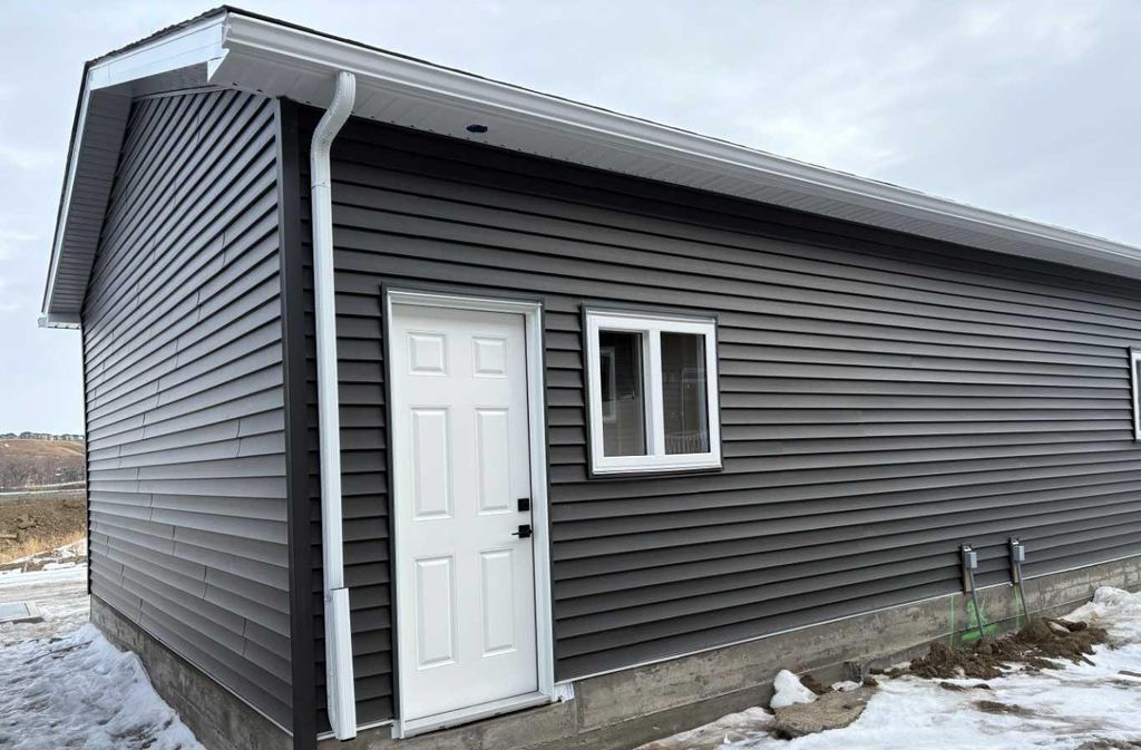 Photo of 862 Wolf Willow Boulevard SE, Calgary, AB T2X 5R5 (MLS # A2288373)