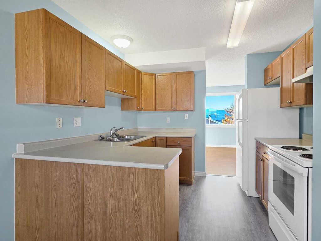 Photo of 85 97 Avenue, Grande Cache, AB T0E 0Y0 (MLS # A2265990)