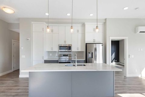 Photo of 19661 40 Street SE #405, Calgary, AB T3M 3H3 (MLS # A2312592)