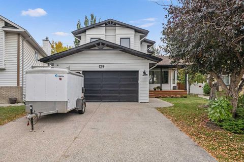 Photo of 129 Sundown Place SE, Calgary, AB T2X 3B7 (MLS # A2299941)