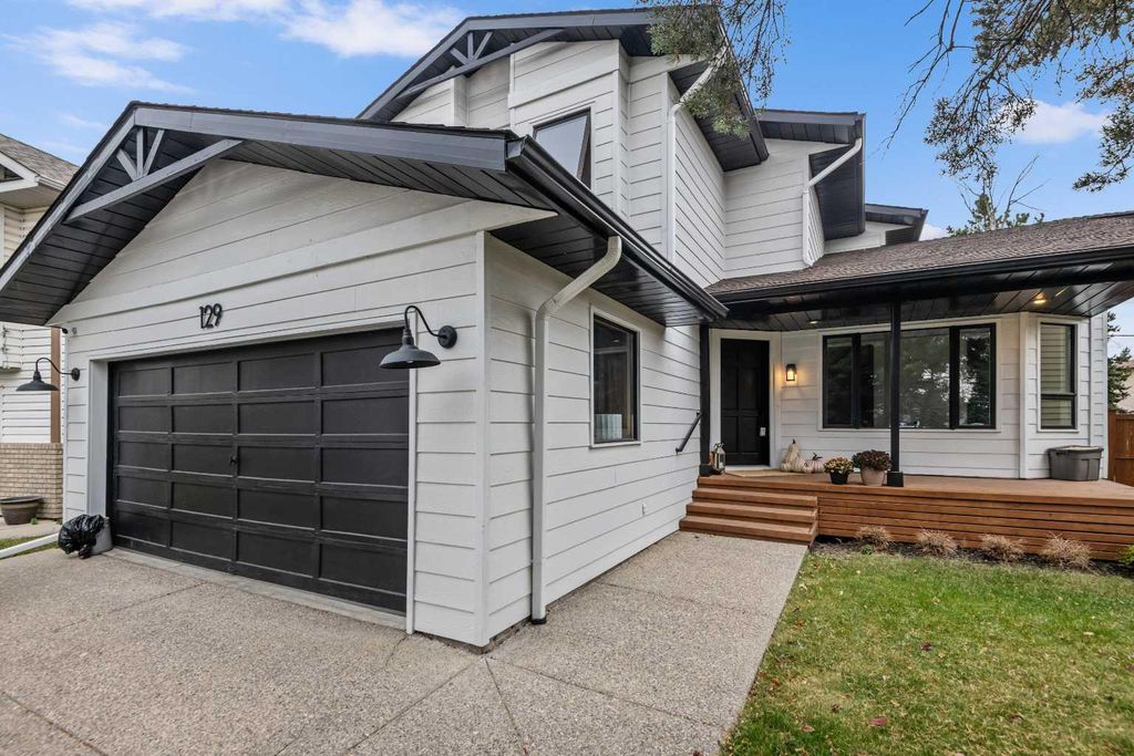 Photo of 129 Sundown Place SE, Calgary, AB T2X 3B7 (MLS # A2299941)