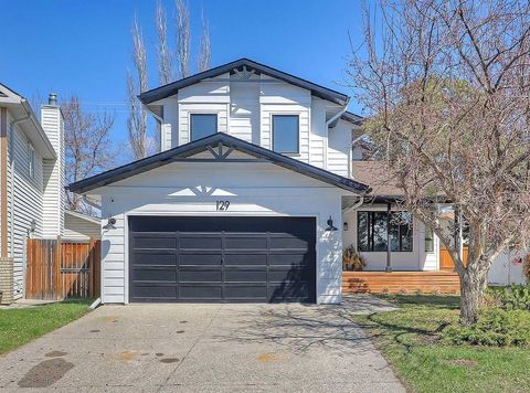 Photo of 129 Sundown Place SE, Calgary, AB T2X 3B7 (MLS # A2299941)