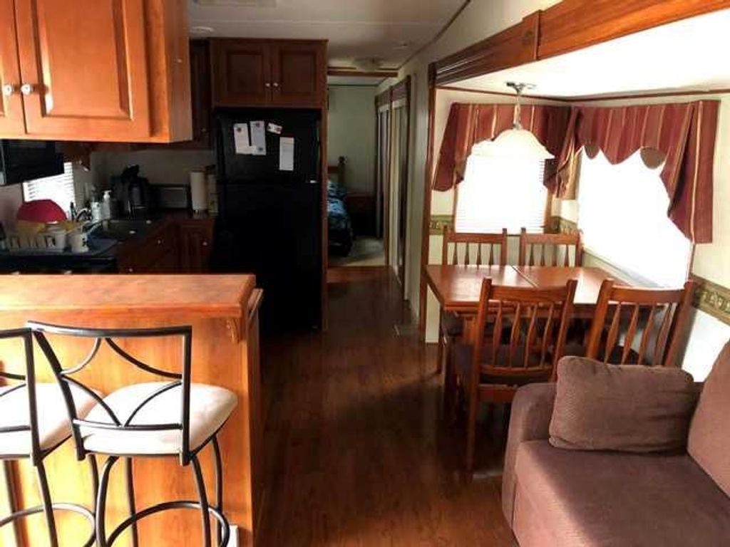 Photo of 561 Carefree Resort, Rural Red Deer County, AB T4G 0K6 (MLS # A2286689)