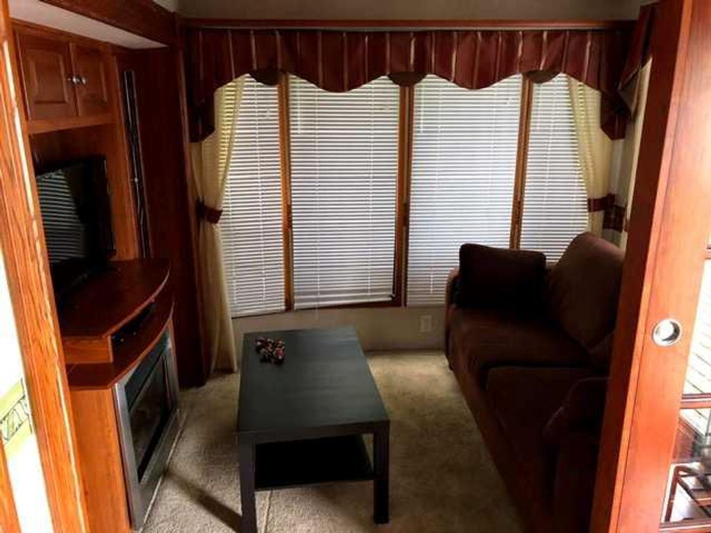 Photo of 561 Carefree Resort, Rural Red Deer County, AB T4G 0K6 (MLS # A2286689)