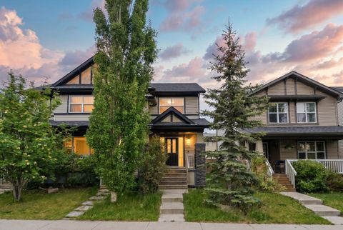 Photo of 212 Panatella Drive NW, Calgary, AB T3K 0T4 (MLS # A2320619)