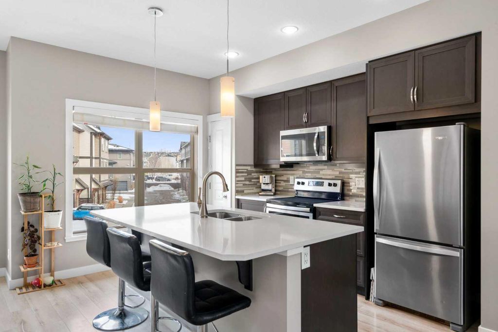 Photo of 32 Horseshoe Crescent #603, Cochrane, AB T4C 2P4 (MLS # A2287191)