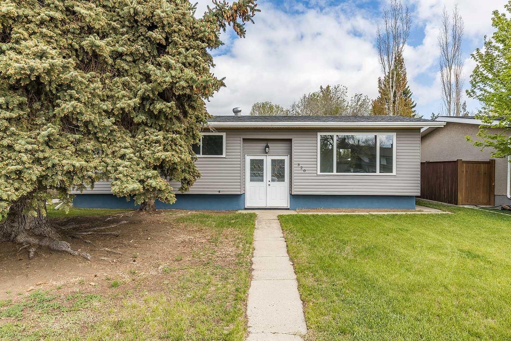 Photo of 320 16 Street NE, Medicine Hat, AB T1A 7L9 (MLS # A2313232)
