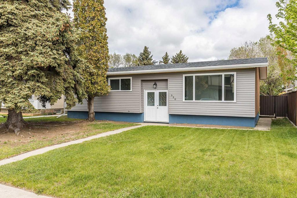 Photo of 320 16 Street NE, Medicine Hat, AB T1A 7L9 (MLS # A2313232)