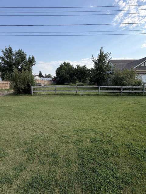 Photo of 188 East 100 South, Raymond, AB T0K 2S0 (MLS # A2338548)
